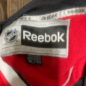 Vintage Reebok Eric Stahl number 12 captain jersey made 2011